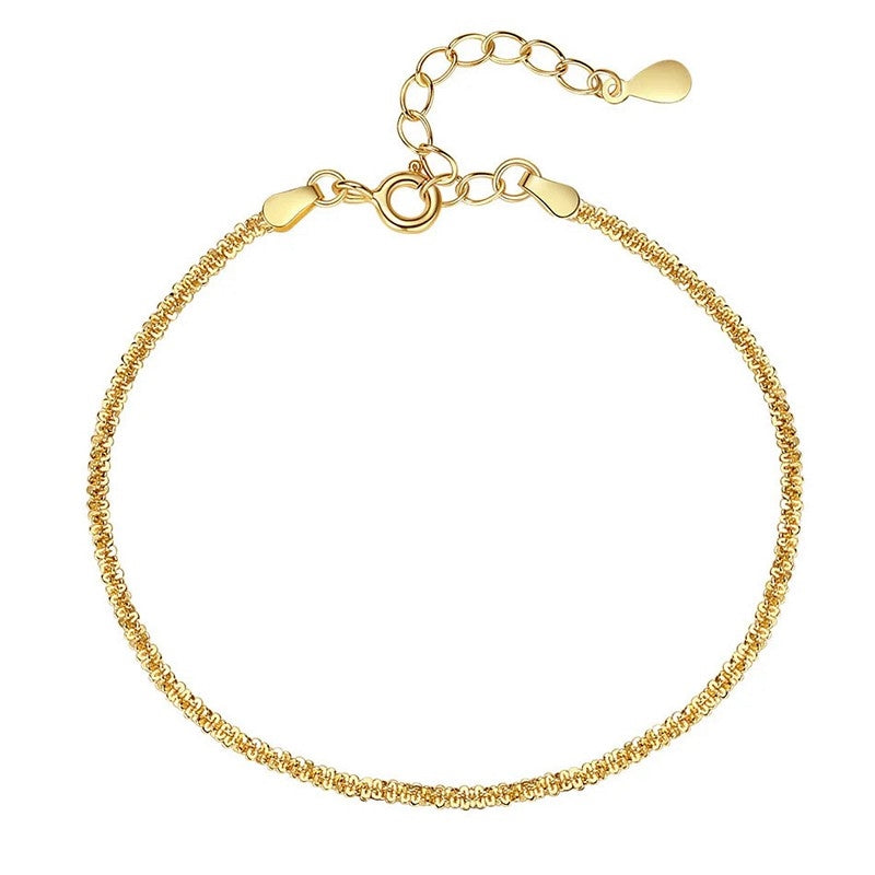 Calina armbånd i 18 karat forgyldt 925 sterlingsølv fra MerlePerle – elegant og tidløst design.
